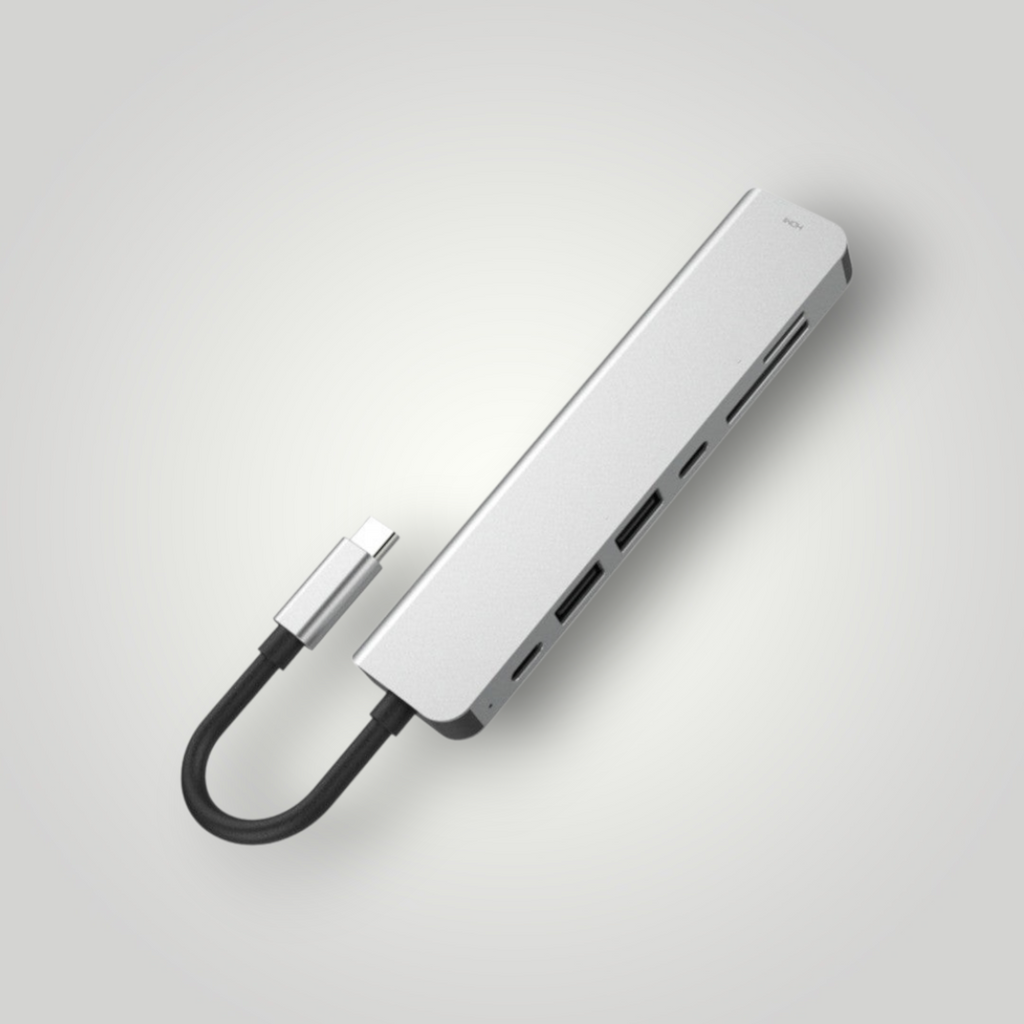 Hub USB tipo C 7 en 1 de Mi tienda en aluminio plateado con múltiples puertos para carga y transferencia de datos