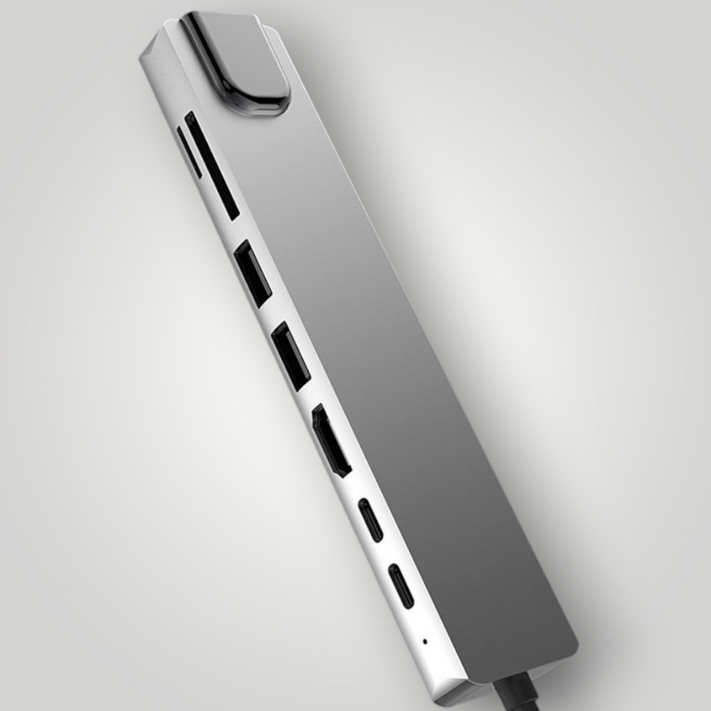 Hub USB tipo C 8 en 1 de Mi tienda fabricado en aleación de aluminio gris con puertos HDMI, RJ45 y carga rápida PD.